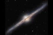 Hubble reveals edge-on spiral galaxy with unique structure